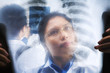 Asian doctors busy working