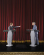 Politicians having debate on stage