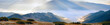 Mountain hazy daybreak with sunbeam and haze