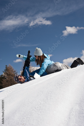 Photo: Couple playing with snow Couple playing with snow