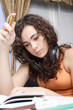 teenage girl reading a book