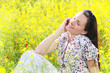 Young woman using mobile phone outdoors