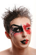 a man with colored painted face