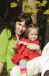 Mother and her baby girl in the park Mother and her baby girl in the park