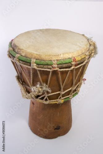 Photo: African Djembé Drum isolated on white background. African Djembé Drum isolated on white background.