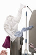 A shirt emerging from the wash basket A shirt emerging from the wash basket