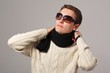 man wearing knitted scarf with sunglasses