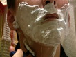 Shaving in mirror