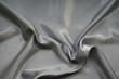Smooth elegant grey silk as background Smooth elegant grey silk as background