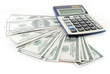 Photo: Heap of dollars and calculator Heap of dollars and calculator