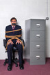 Businessman tied up in the office