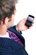 Businessman checking his phone for emails.