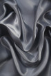 Smooth elegant grey silk as background Smooth elegant grey silk as background