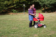 young couple and pram