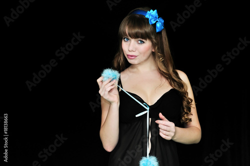 Photo: Pin-up girl over black background Pin-up girl over black background
