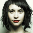 Young beautiful woman with strict hairstyle