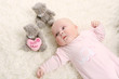 a young and beautiful baby in pink