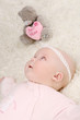 a young and beautiful baby in pink