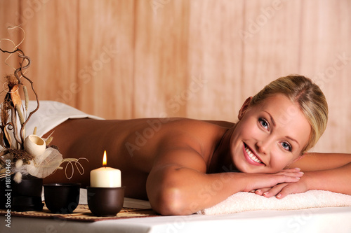 Photo: smiling young woman relaxation in spa salon smiling young woman relaxation in spa salon