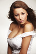 attractive young woman relaxing on white background