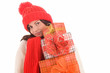 Pretty young woman holding gifts