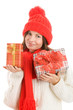 Pretty young woman holding two gifts