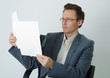 businessman reading paperwork