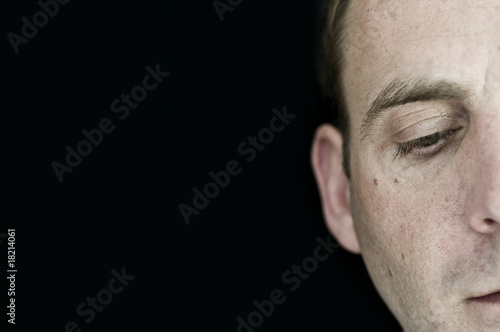 Photo: Man looking down Man looking down