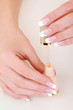 Beautiful woman hands with bottle enamel Beautiful woman hands with bottle enamel