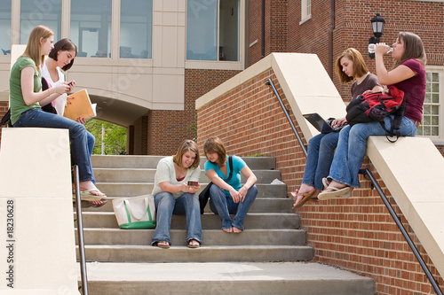 Photo: Group of college Girls on Campus Studying Group of college Girls on Campus Studying