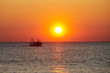 Fishing boat at sunset
