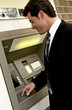 Foto: Man at ATM Man at ATM