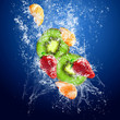 Drops around fruits under water