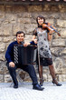 Two musicants with instruments