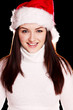 Pretty woman wearing santa hat