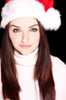 Pretty woman wearing santa hat