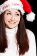 Pretty woman wearing santa hat