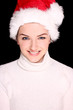 Pretty woman wearing santa hat
