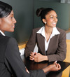 Photo: Multi-ethnic business team looking away Multi-ethnic business team looking away