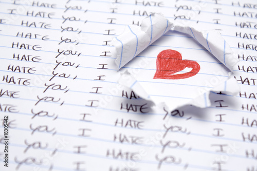 Photo: Some hand writting saying i hate you. Red heart hand drawing Some hand writting saying i hate you. Red heart hand drawing