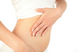 Photo: Woman's hand on stomach Woman's hand on stomach