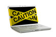 yellow caution tape on a computer screen