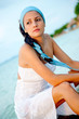 Beach girl pensive