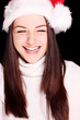 Pretty woman wearing santa hat
