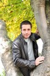 Young man in atree