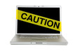 yellow caution tape on a computer screen