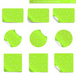 Realistic green stickers with peeling corners and water drops
