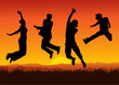 Jumping people on sunset