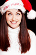 Pretty woman wearing santa hat