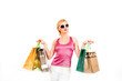 Young sexy shopping girl with lots of colourfull bags